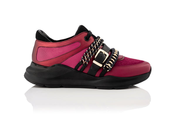 burgundy leather sneaker with black sole and chain adornments 
