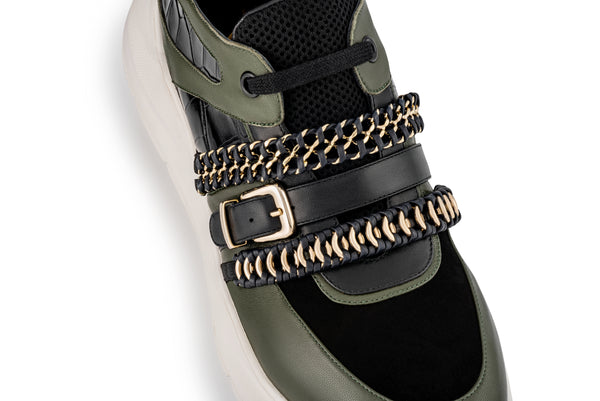 gender neutral sneaker made from italian leather and chain adornments 